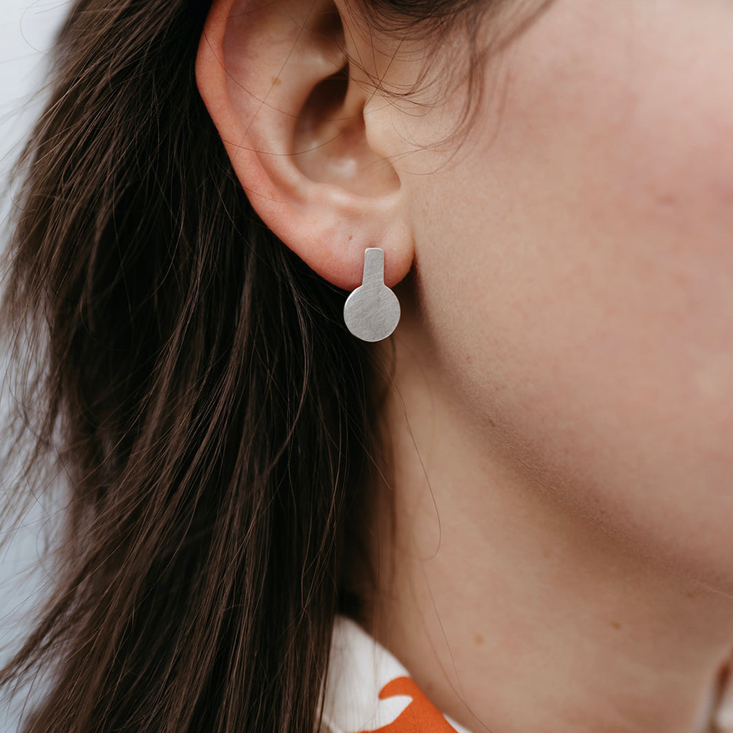 With Earrings